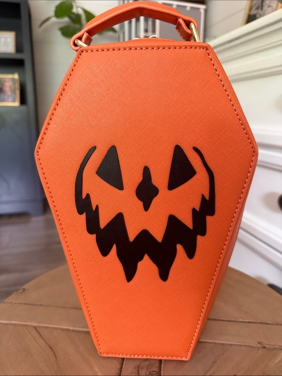 Lively Ghosts Handbags - Coffin-Shaped Halloween Handbag with Jack-O'-Lantern Face